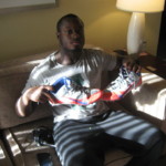 Orleans Darkwa with 2016 New York Giants Game Worn & Signed Red, Gray & Blue Nike Alpha Pro Cleats