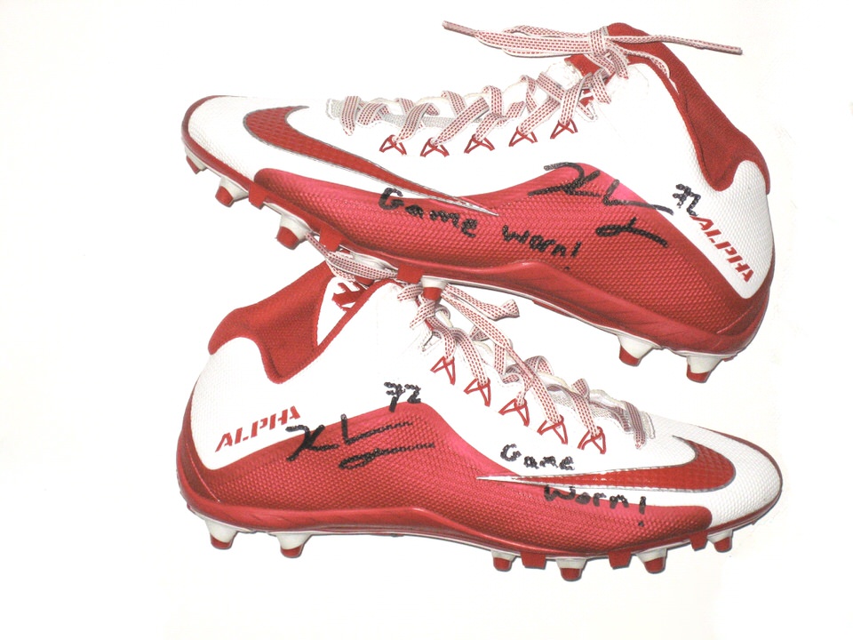 white and red cleats