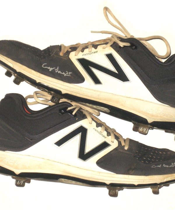 navy blue and white baseball cleats