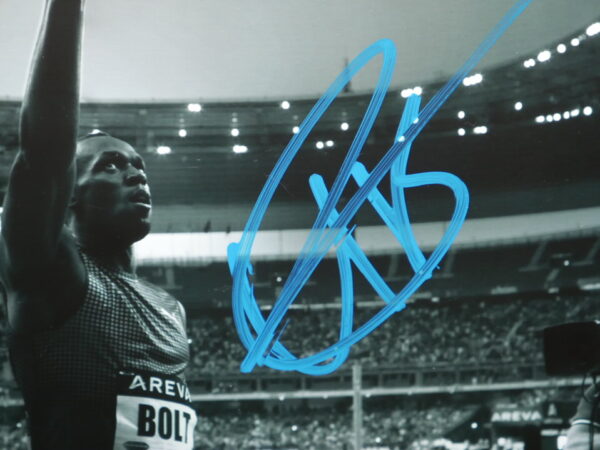 Usain Bolt Autographed Signed Paris MEETING AREVA 100 Metres 8 x 10 Photo