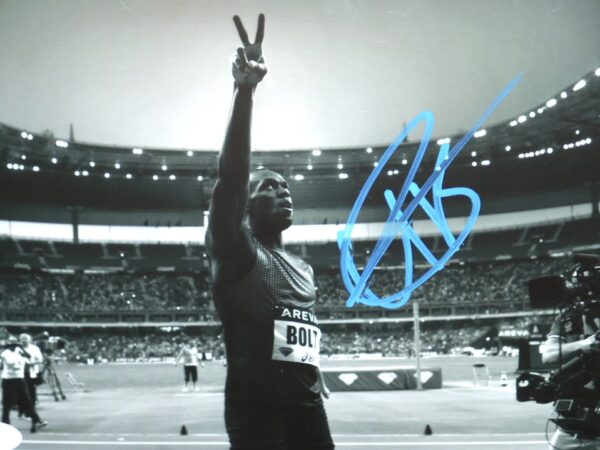 Usain Bolt Autographed Signed Paris MEETING AREVA 100 Metres 8 x 10 Photo