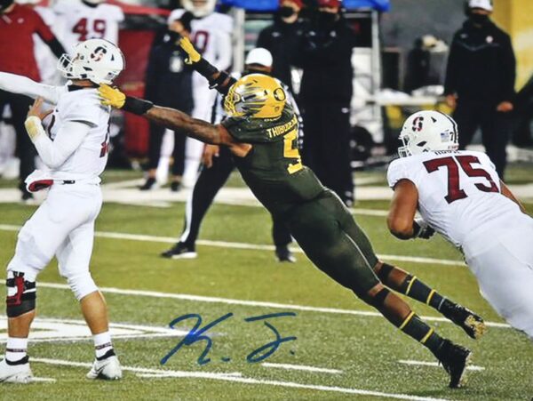 Kayvon Thibodeaux Signed Oregon Ducks Jump 8 x 10 Photo - Beckett Witnessed